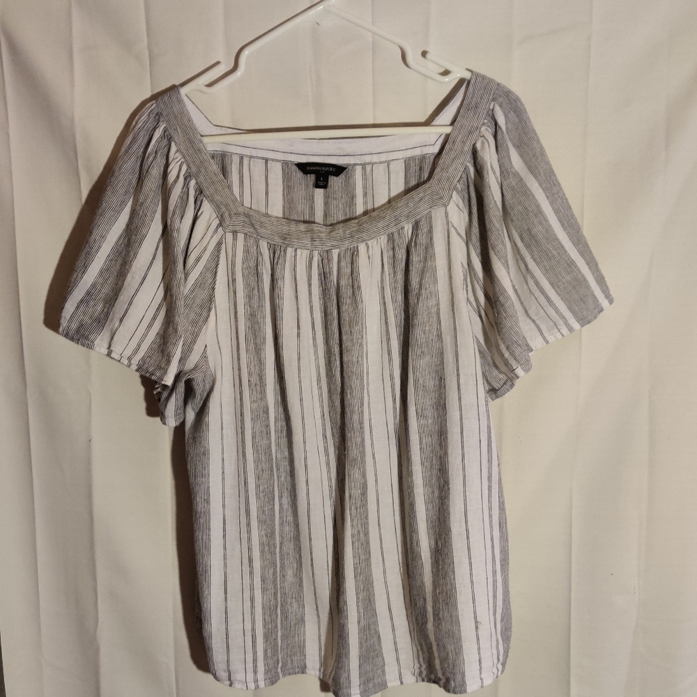 White blouse with blue stripes